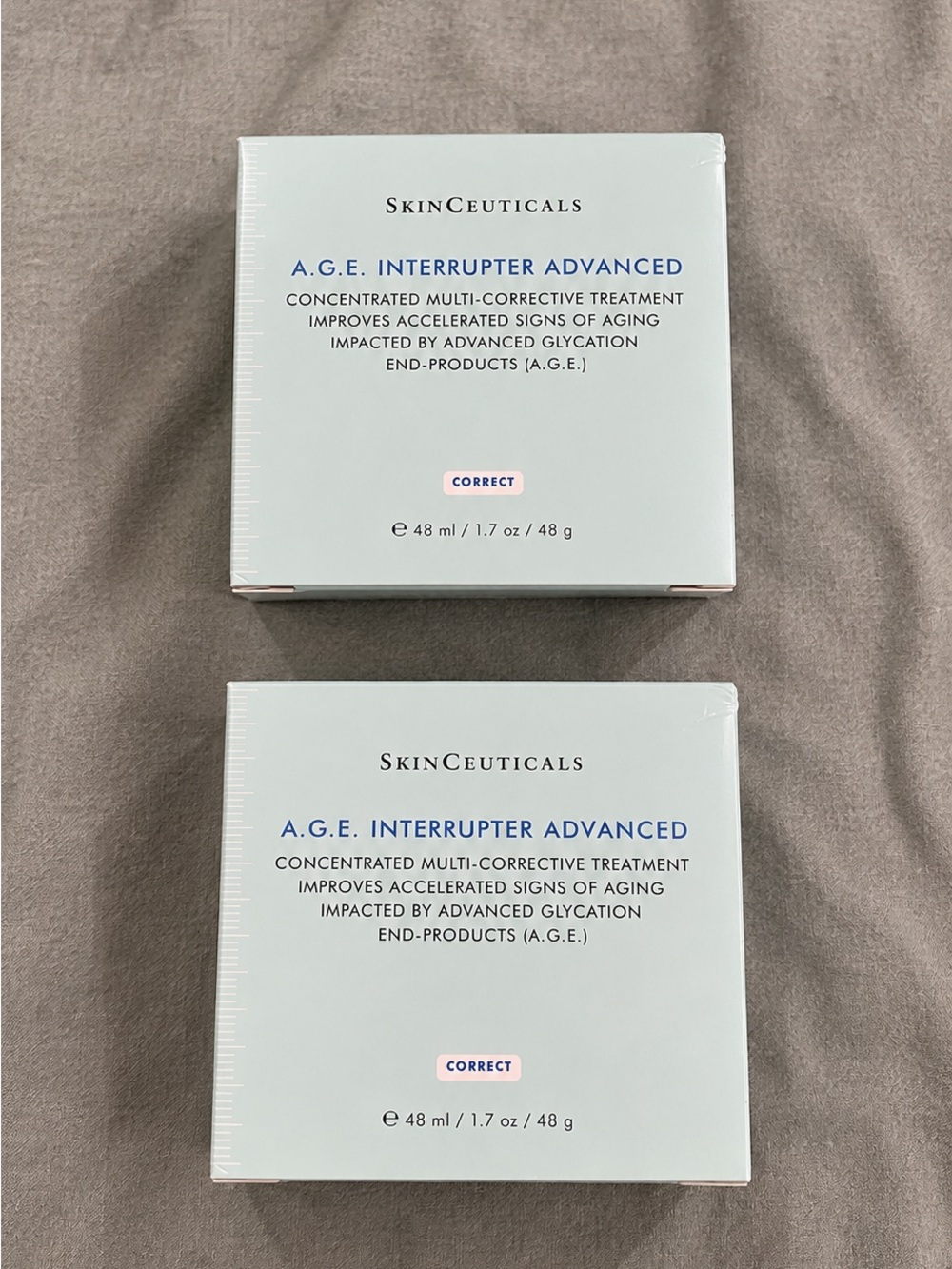 SkinCeuticals A.G.E. Interrupter Advanced - White and Blue Text